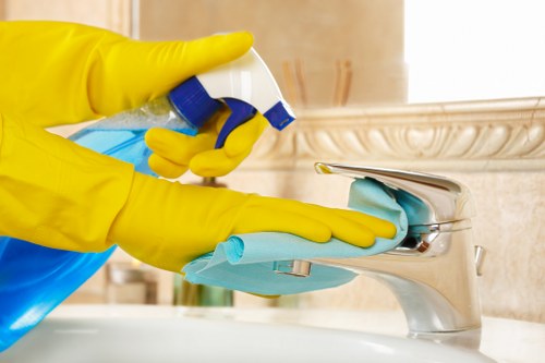 Local sofa cleaning team working in a Brixton flat